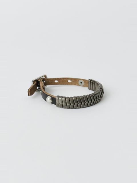 Black Double Buckle Bangle Bracelet by Toga Pulla on Sale