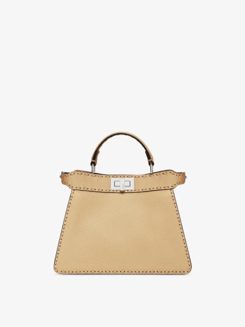 FENDI Iconic small Peekaboo ISeeU bag, made of sand-color Cuoio Romano leather, finished by hand with matc