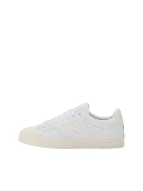 New Balance 100 가죽 운동화