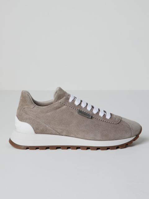 Suede runners with shiny tab