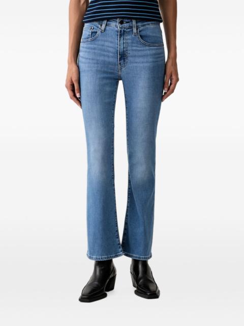 Levi's 725 faded flared jeans