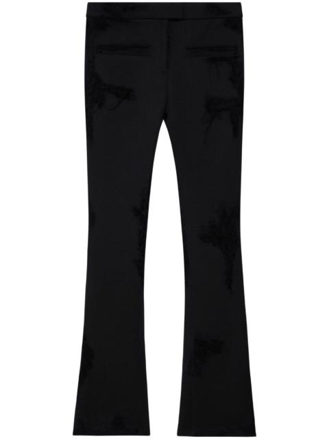 courrèges distressed-effect flared trousers
