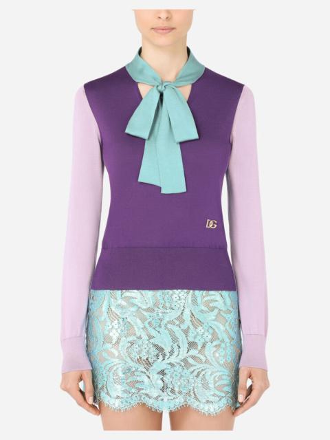 Dolce & Gabbana Long-sleeved multi-colored silk sweater with pussy-bow and DG embellishment
