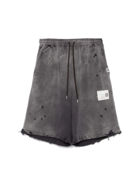 distressed track shorts