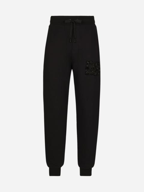 Dolce & Gabbana Jogging pants with rhinestone-detailed DG patch