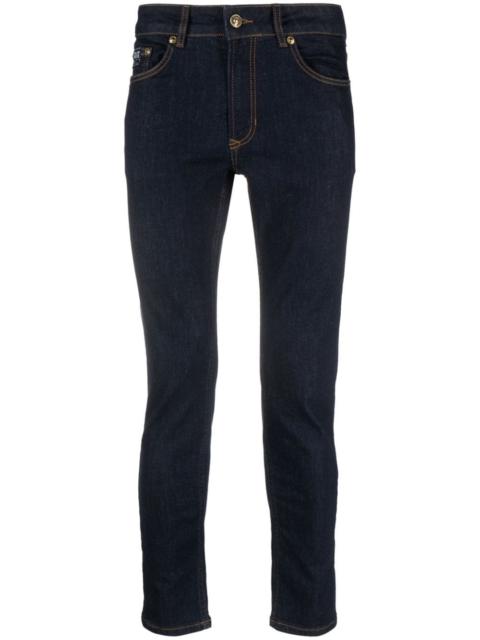 VERSACE JEANS COUTURE logo-patch skinny jeans