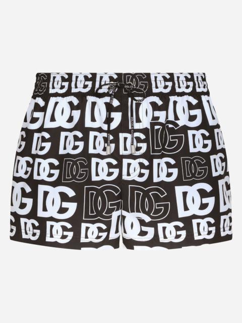 Short swim trunks with all-over DG print