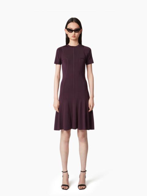 NINA RICCI PEPLUM DRESS IN TUBULAR CORSET