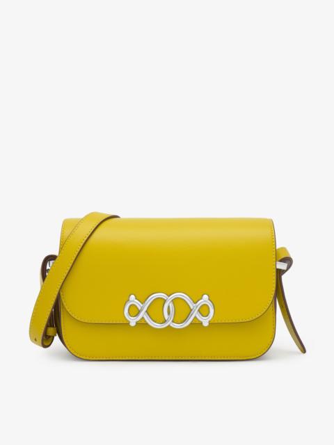 TOUS Medium mustard-colored Flap crossbody bag TOUS Infinity