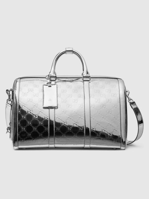GUCCI Medium embossed GG duffle bag
