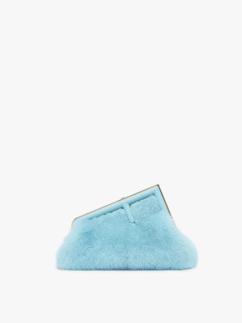 FENDI Small Fendi First bag in light blue soft mink with an oversized F metal clasp with tone on tone napp