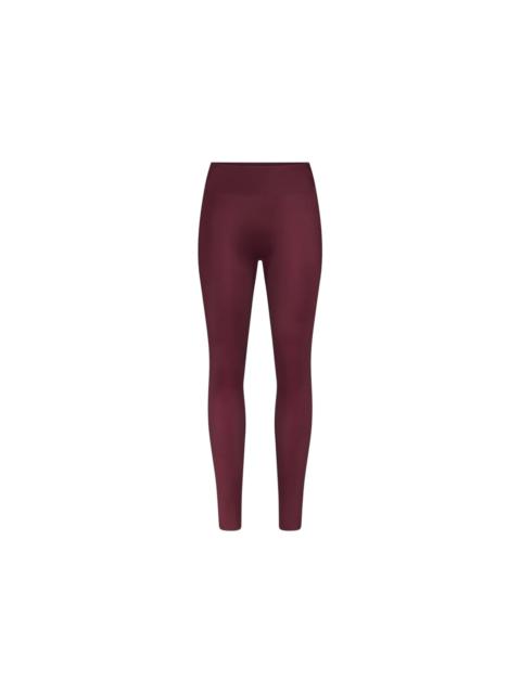 Nike Nike x SKIMS Women's Shine Bonded Waist 26" Legging Currant