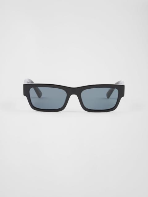Prada Sunglasses with iconic metal plaque