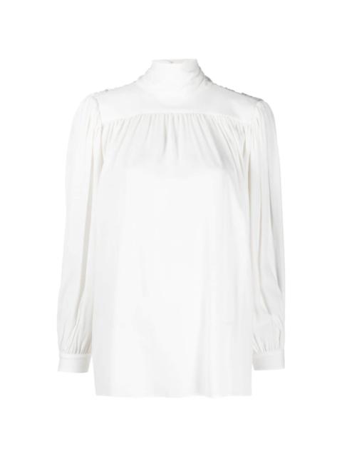 bow-fastening crepe top