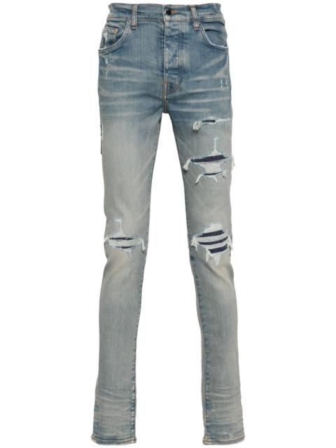 logo-patch ripped skinny jeans