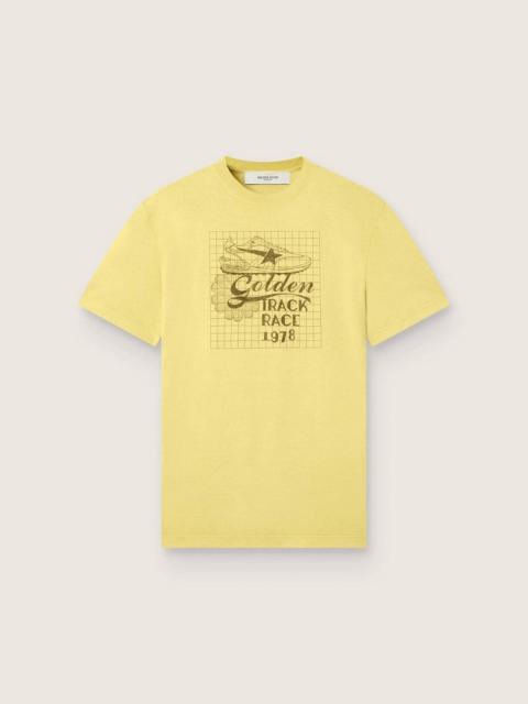 Golden Goose Men's T-shirt in yellow cotton with logo and print