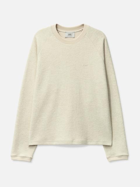 AMI Paris RAGLAN SLEEVED CREWNECK SWEATSHIRT