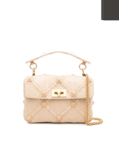 Roman Stud raffia shoulder bag