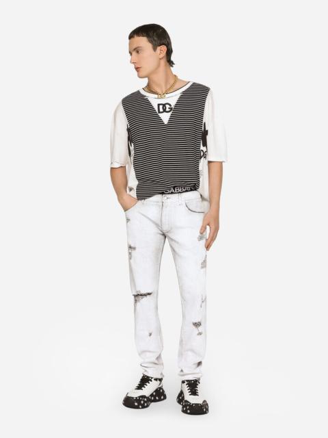 Dolce & Gabbana Coated skinny stretch jeans with rips