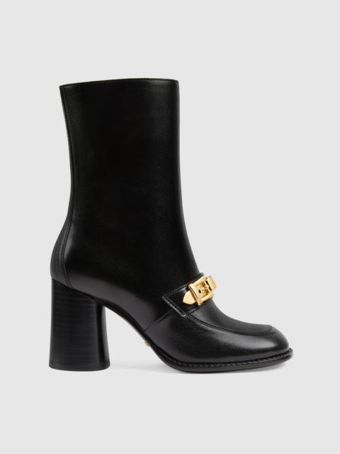 GUCCI Women's ankle boot with chain