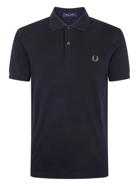 Fred Perry Introducing the 'FRED PERRY' THE FRED PERRY SHIRT, a timeless piece from the prestigious brand FRED 
