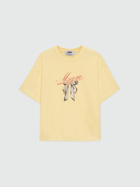 MSGM Yellow T-shirt with MSGM graphic print and bow.