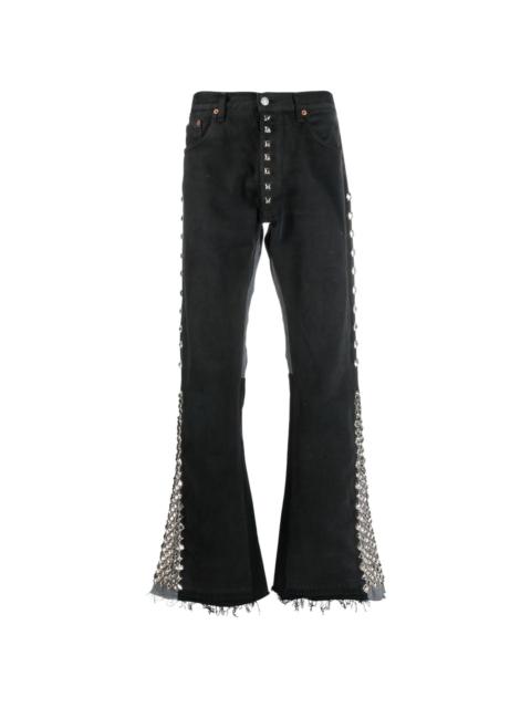 logo-patch spike-stud jeans