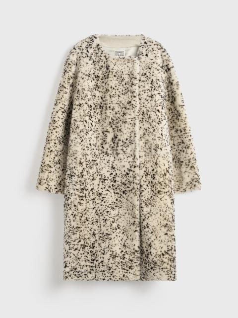 TOTEME Stracciatella shearling coat black/white