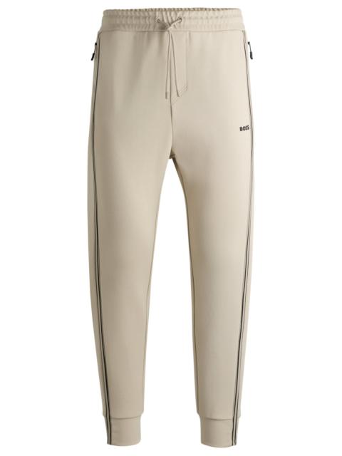 BOSS TRACKSUIT BOTTOMS WITH TAPE INSERTS