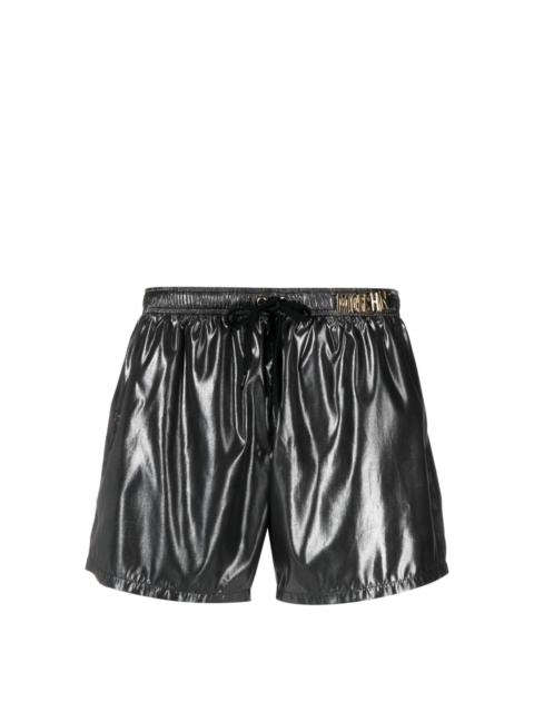 Moschino logo-plaque metallic beach shorts