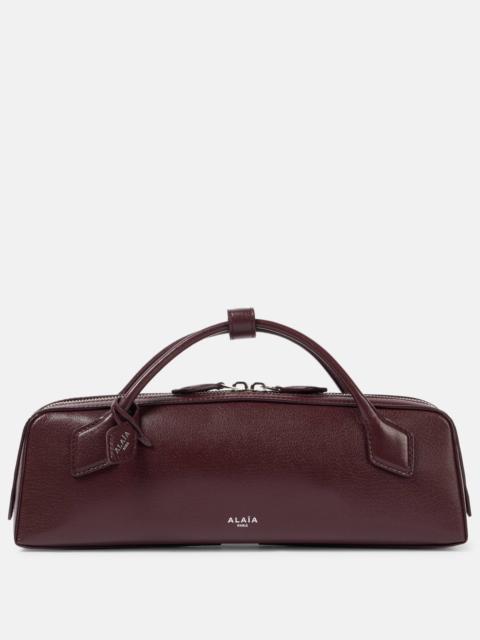 Alaïa LE TECKEL CLUTCH IN SUEDE GOATSKIN | REVERSIBLE