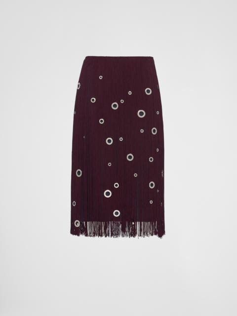 Midi-skirt with fringe and grommet embellishment