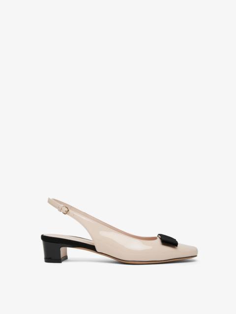 Iconic bow slingback pumps