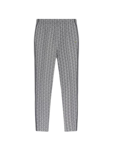 LACOSTE patterned track pants