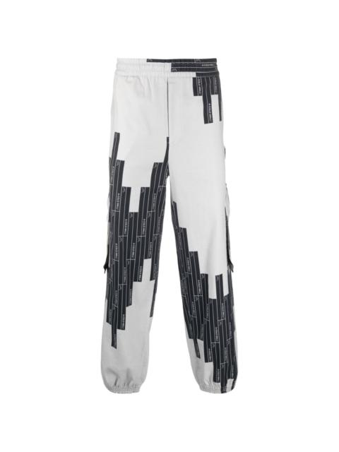 Vector-monogram tapered trousers
