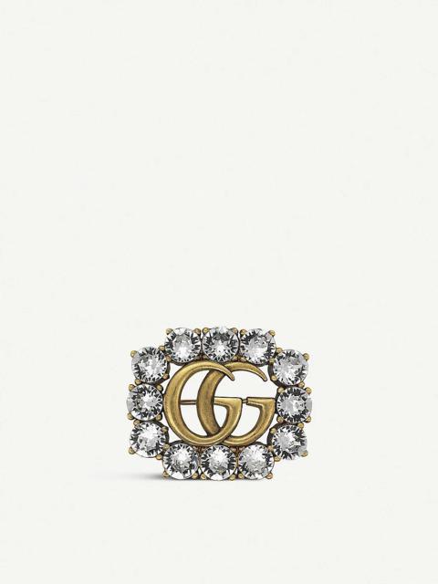 Double G gold and crystals brooch