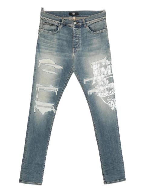 Amiri Ripped Print Jeans