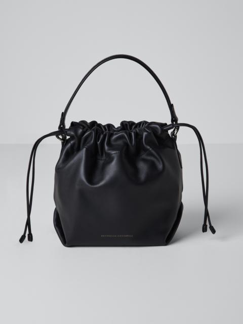 Brunello Cucinelli Matte calfskin bucket bag with shiny handle