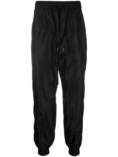 drawstring-waistband tapered-leg trousers