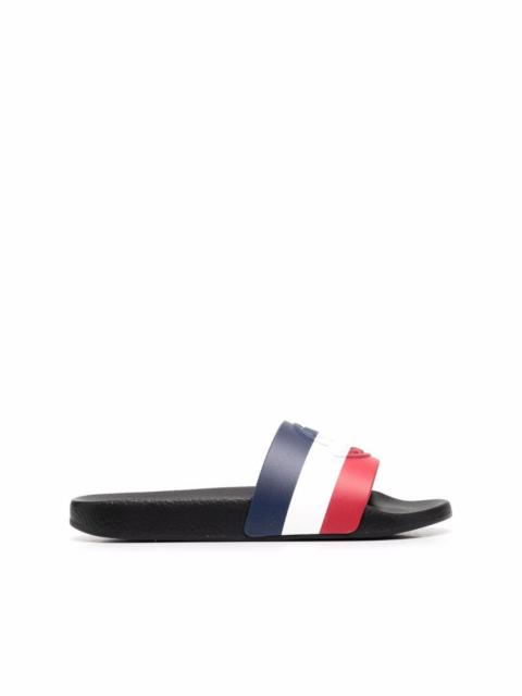 Moncler embossed-logo striped flip flops