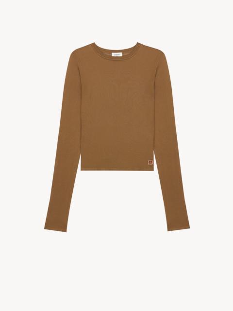 SAINT LAURENT CASSANDRE SHEER TOP IN KNIT