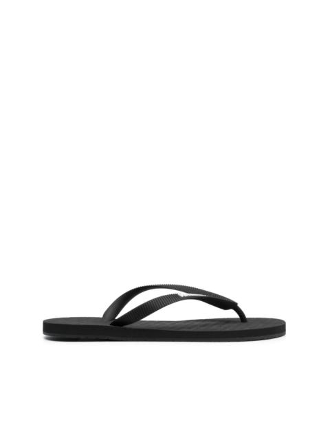 VETEMENTS logo-embossed flip flops