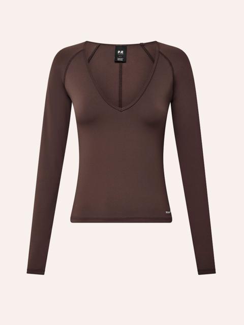 P.E NATION FOUNDATION V NECK LONG SLEEVE TOP IN DARK PLUM