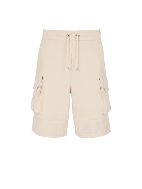 Cargo shorts with reflective Balmain logo