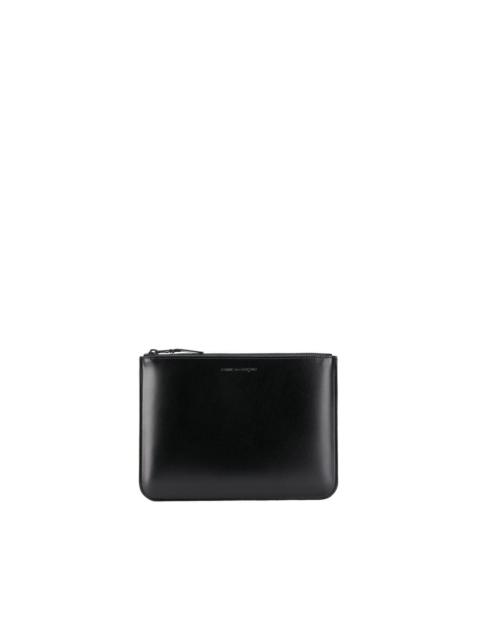 Comme Des Garçons embossed logo wallet