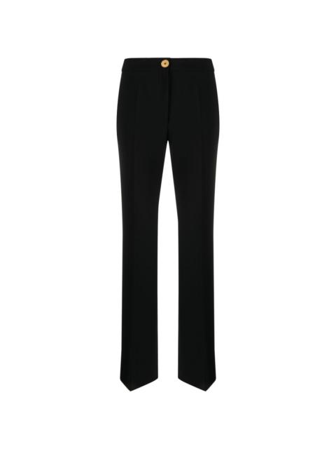 Moschino pressed-crease button-fastening tailored trousers