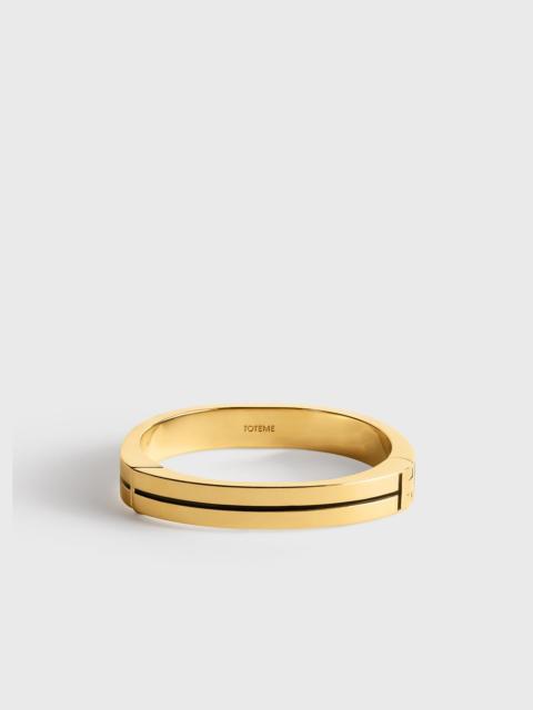 TOTEME Signature stripe bracelet black/gold