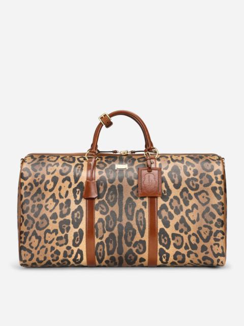 Medium travel bag in leopard-print Crespo with branded plate