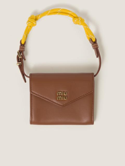 Miu Miu Leather wallet with leather and cord shoulder strap
