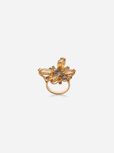 Spring ring in yellow 18kt gold with citrine butterfly